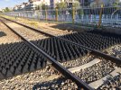 Example from Turkey (Aydin station) - Part of the RESTRAIL pilot test (...)(Rubber anti-trespass panels in combination with intermediate fencing between the tracks. Other implemented measures but not visible in this photo: fences at platform end, prohibitive signs and CCTV surveillance system.