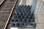Example from the UK (Manchester Piccadilly)(Rubber anti-trespass panels at platform end in combination with fencing and prohibitive signage