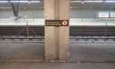 Example from a station in Madrid, Spain(Intermediate fencing between tracks combined with prohibitive signage