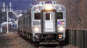 Example form a station in New Jersey (USA)(Intermediate fencing between tracks (view from the platform end)