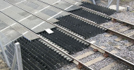 (Rubber panels next to a level crossing